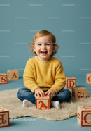 Happy toddler playing with alphabet blocks indoors