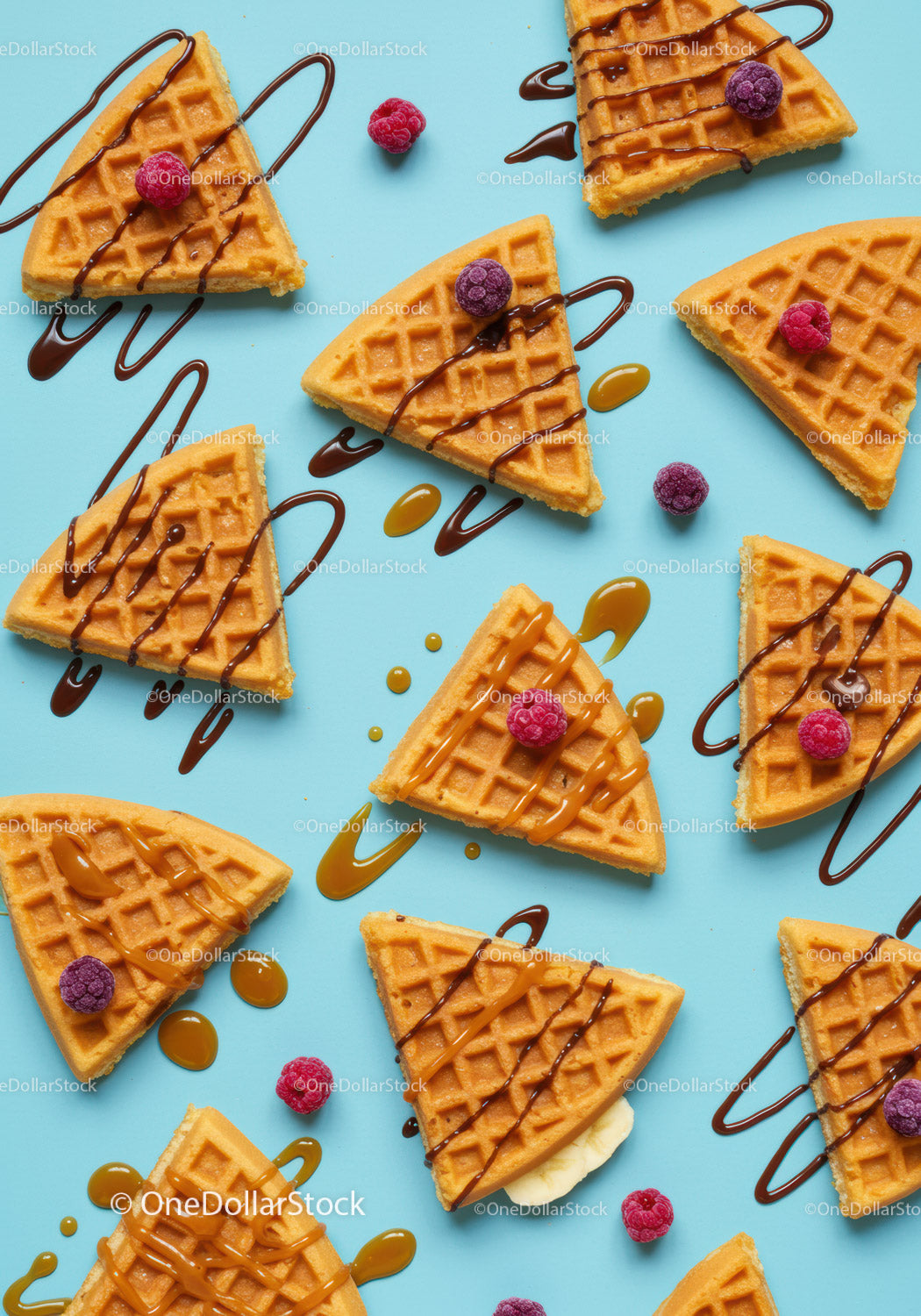 Sweet waffle slices with drizzled chocolate and berries