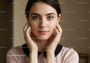 Elegant Young Woman Portrait with Clear Skin and Green Eyes