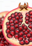Close up of ripe pomegranate seeds inside fruit