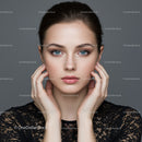 Close-Up Portrait of a Young Woman with Blue Eyes and Flawless Skin