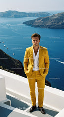 Man in Yellow Suit Posing with Stunning Ocean View