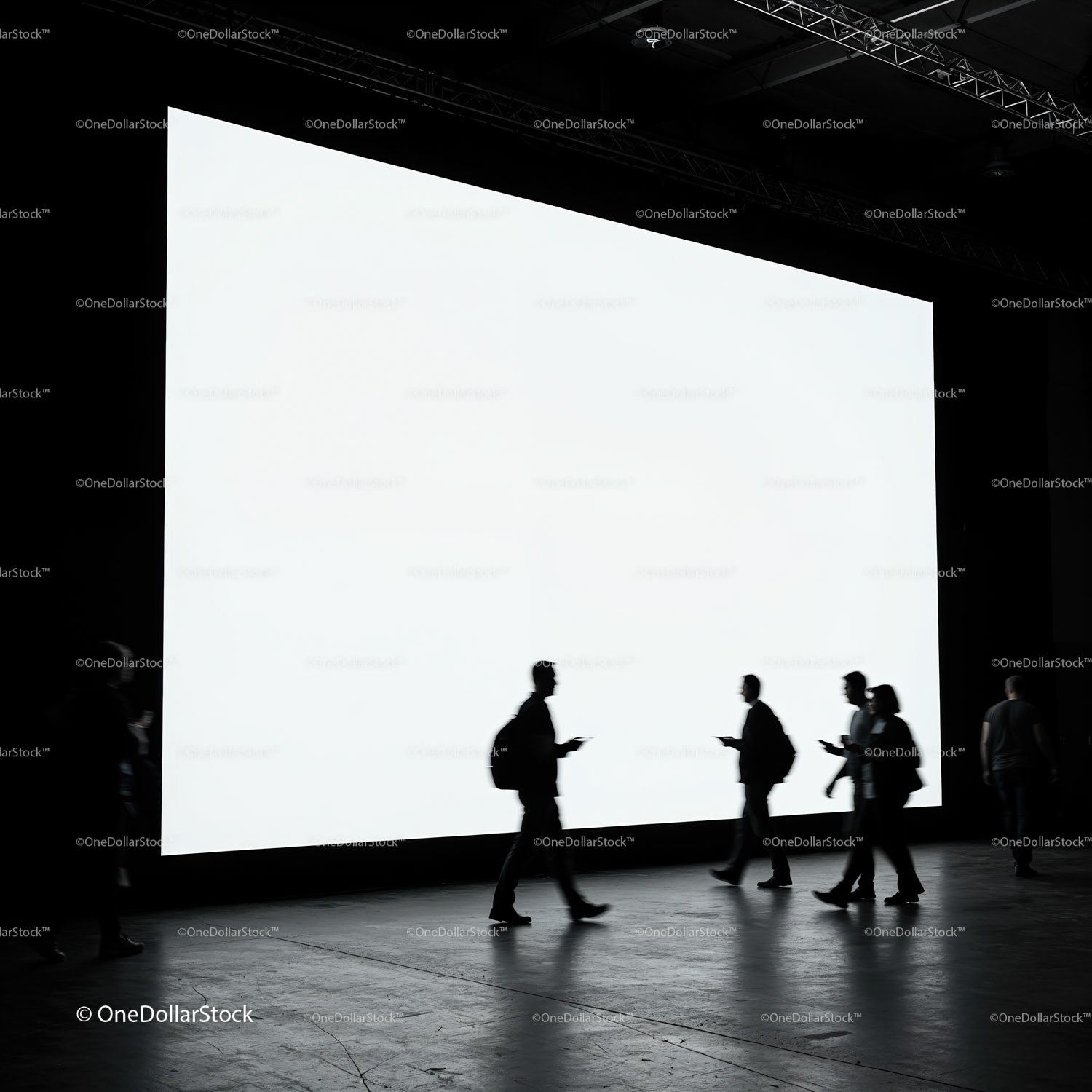 Silhouettes of People Walking Past Bright Screen