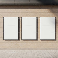 Three Blank Vertical Posters on Beige Stone Wall
