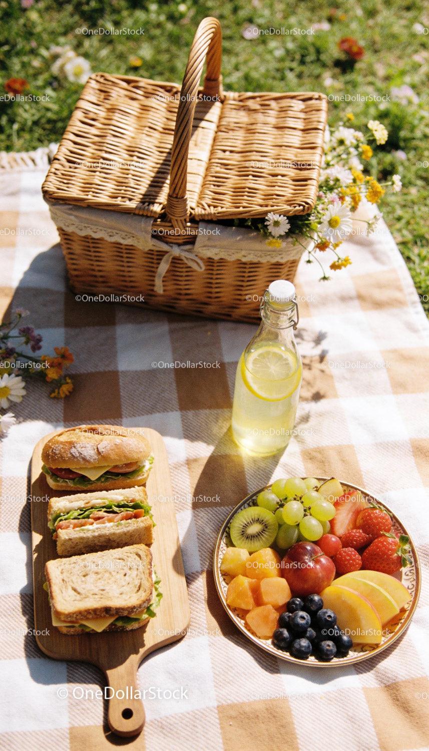 Fresh Picnic Spread with Sandwiches and Fruit Plate