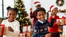 Joyful Kids Celebrating Christmas with Gifts and Smiles
