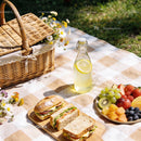 Fresh picnic spread with sandwiches and fruit platter