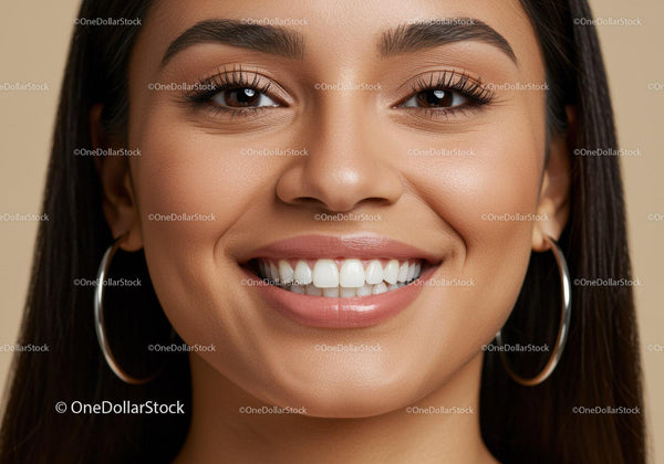 Close Up of Smiling Woman with Flawless Skin and Hoop Earrings