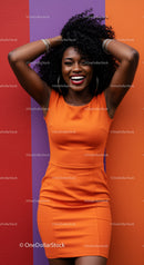 Vibrant Woman Wearing Orange Dress Laughing Against Colorful Wall