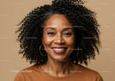 Portrait of a Happy African American Woman with Curly Hair and Hoop Earrings
