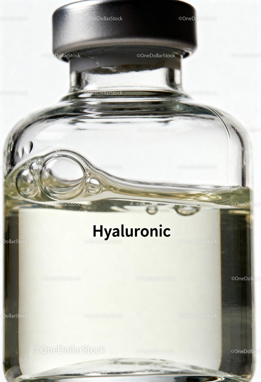 Close-up of Hyaluronic Acid Serum in Clear Glass Bottle