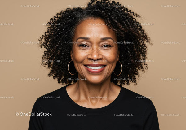 Confident Woman with Curly Hair and Hoop Earrings in Professional Portrait