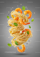 Floating spaghetti with shrimp and fresh mint leaves