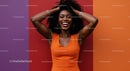 Vibrant Portrait of a Smiling Black Woman Against Colorful Wall