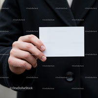Man Holding Blank White Business Card Close Up