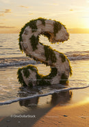 Large Decorative Letter S on Beach at Sunset