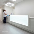 Medical professional preparing supplies in clean clinic