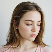 Portrait of Young Woman with Natural Makeup and Relaxed Expression