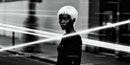 Portrait of elegant woman with platinum hair in urban night