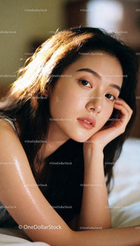 Calm portrait of young woman with natural glowing skin