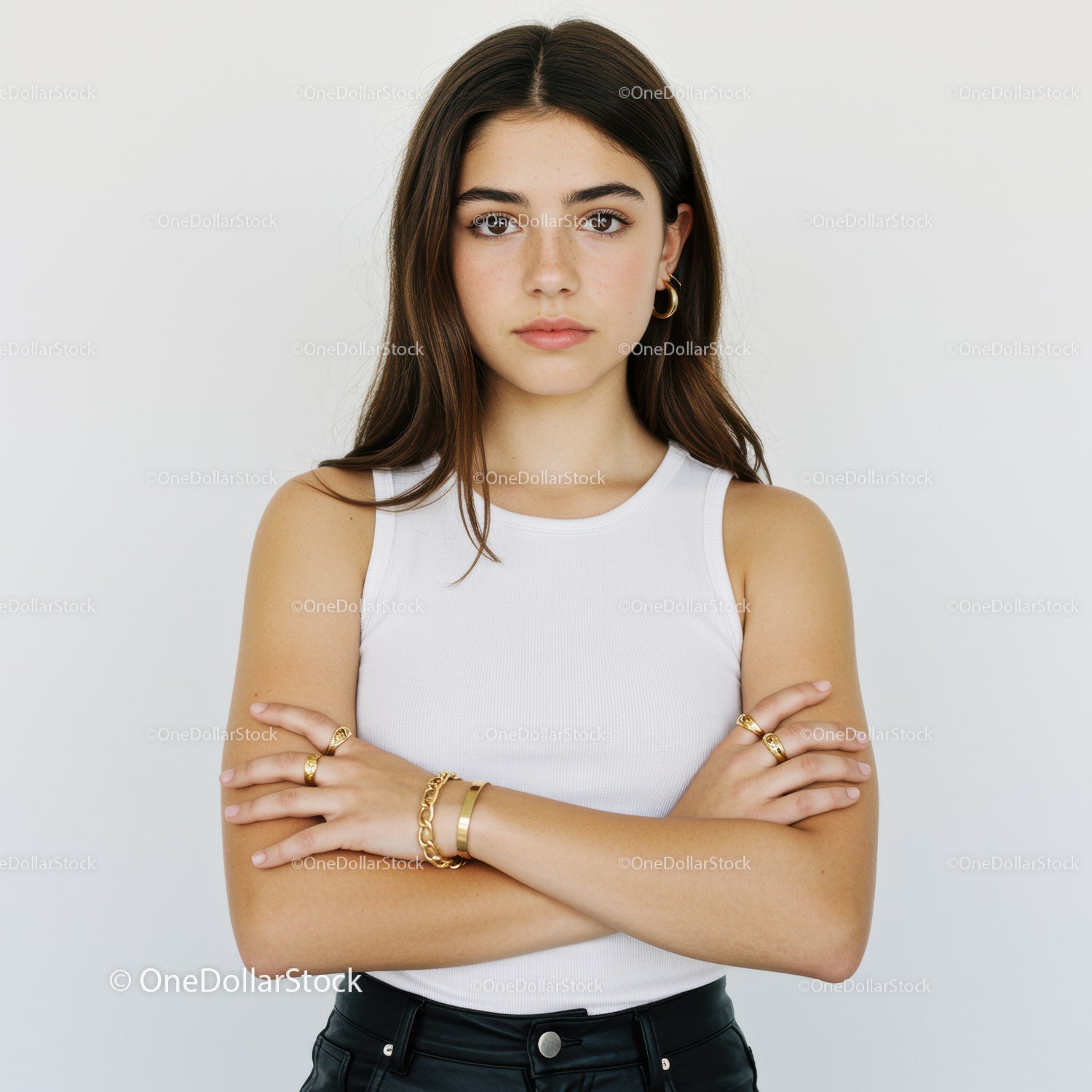Stylish Young Woman in White Tank Top with Jewelry