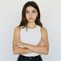 Stylish Young Woman in White Tank Top with Jewelry