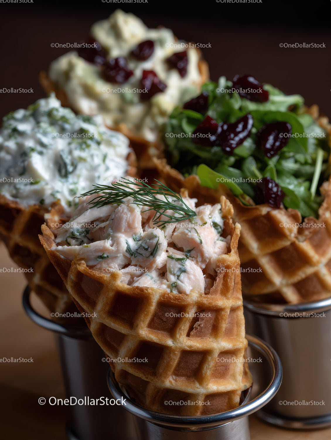 Indulgent Waffle Cone Appetizers with Fresh Herb and Cherry Toppings