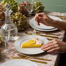 Elegant Lemon Cake with Floral Centerpiece and Gold Cutlery