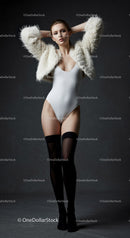 Elegant Model in White Fur Jacket and Bodysuit