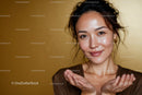 Confident Woman Smiling in Casual Modern Indoor Portrait