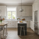 Bright Modern Kitchen with White Cabinets and Wooden Flooring