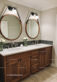 Double Bathroom Vanities with Wooden Cabinets and Modern Lighting