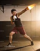 Determined boxer throwing a powerful punch in gym