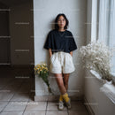 Casual Fashionable Woman with Flowers Indoor Natural Light