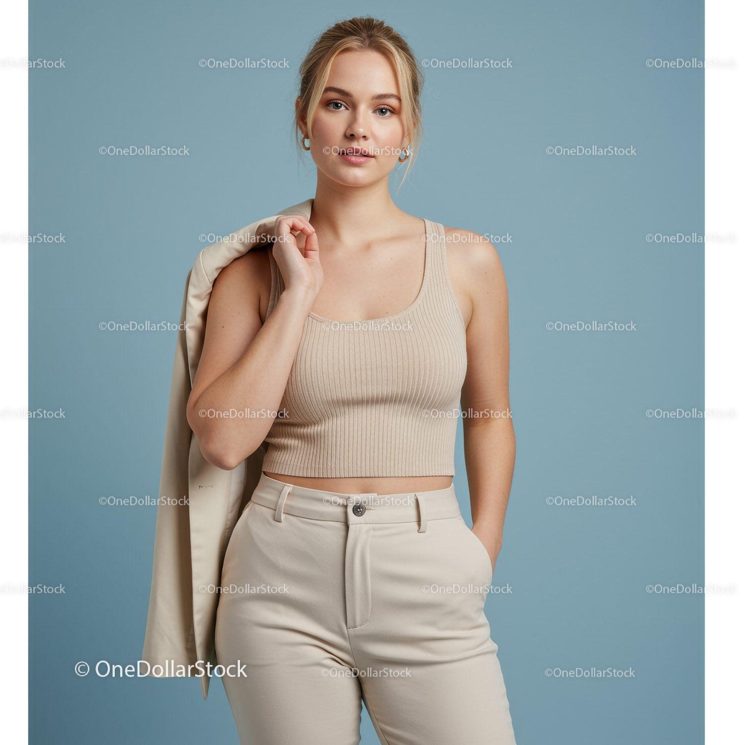 Portrait of a Young Woman in Beige Top and Cream Pants
