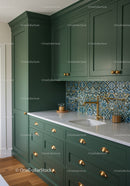 Green Kitchen Cabinets with Gold Handles and Mosaic Backsplash