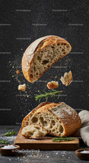 Rustic sliced bread with floating crumbs and rosemary