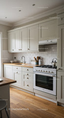 Bright Modern Kitchen with Wooden Countertop and White Cabinets