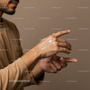 Close-up of a Hand Applying Lotion for Skin Care Routine
