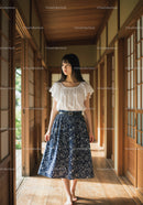 Young Woman in Summer Dress Walking Through Traditional Japanese Interior