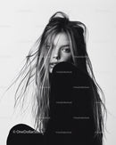 Black and White Artistic Portrait of a Young Woman with Messy Hair