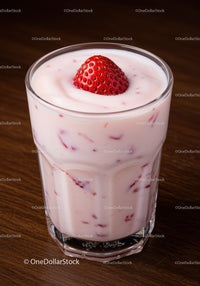 Fresh strawberry yogurt with whole strawberry topping