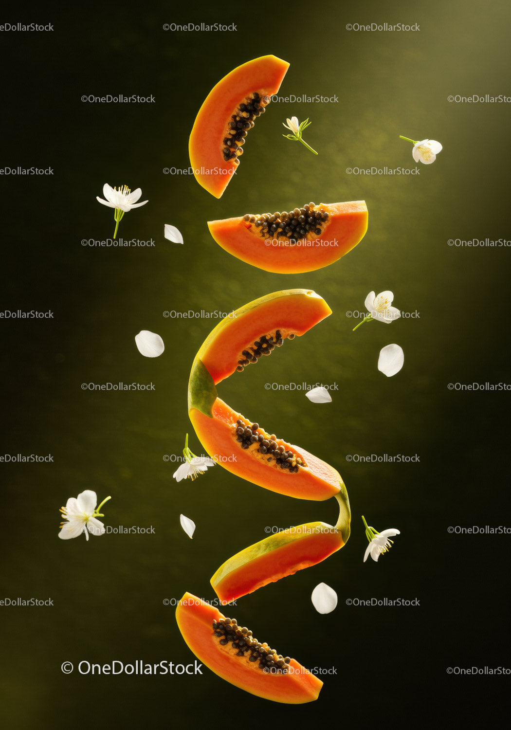 Fresh papaya slices with delicate white flowers floating