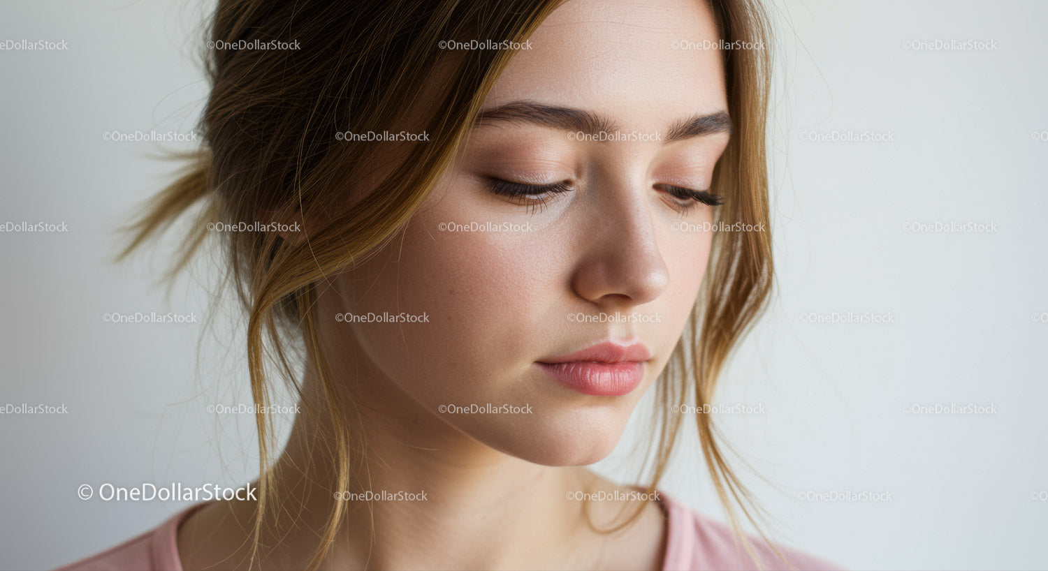 Serene Young Woman with Natural Makeup and Soft Lighting