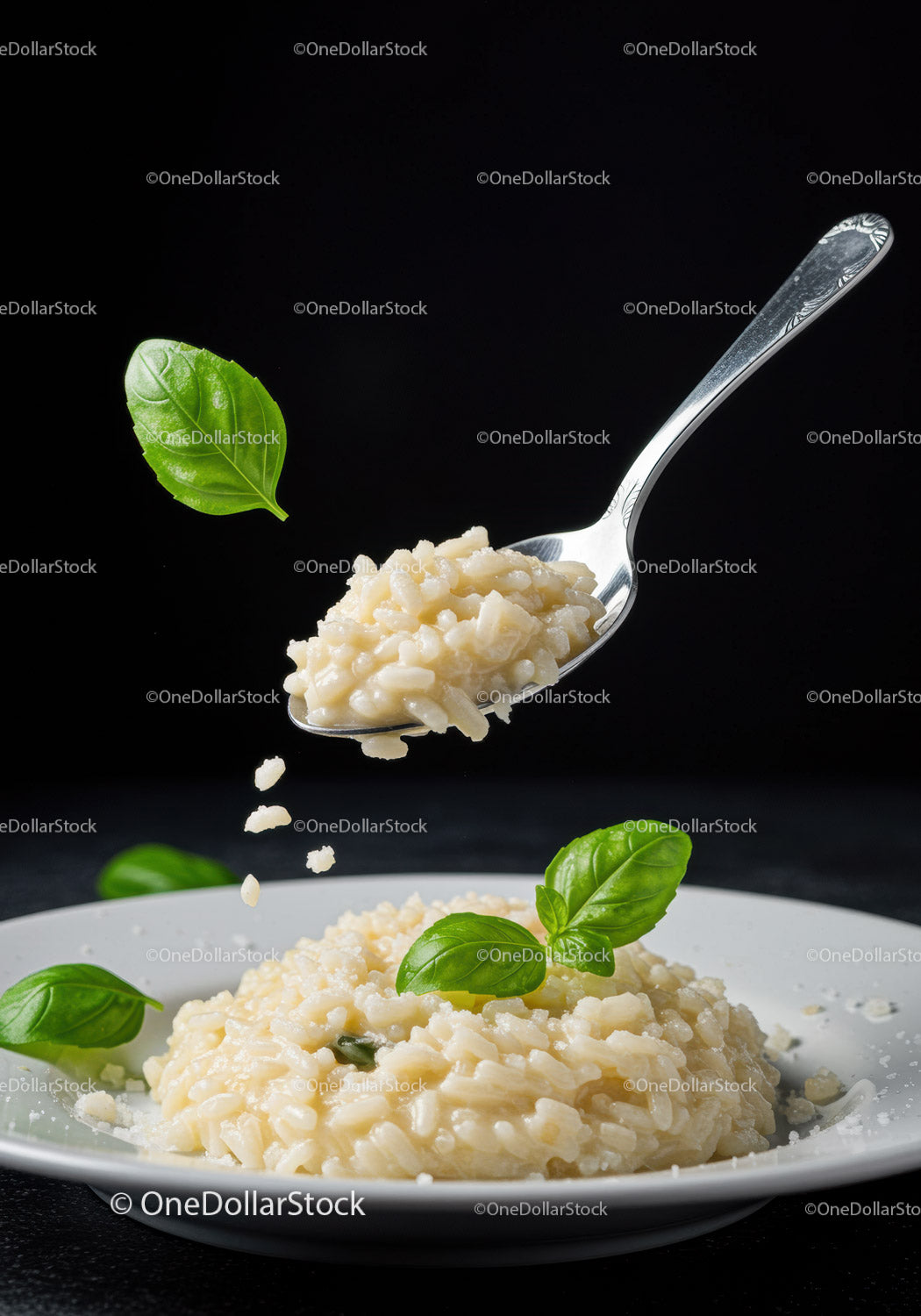 Creamy Risotto with Fresh Basil Leaves on Spoon