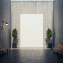 Modern concrete courtyard with greenery and benches