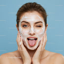 Young Woman Applying Facial Mask with Bright Healthy Skin
