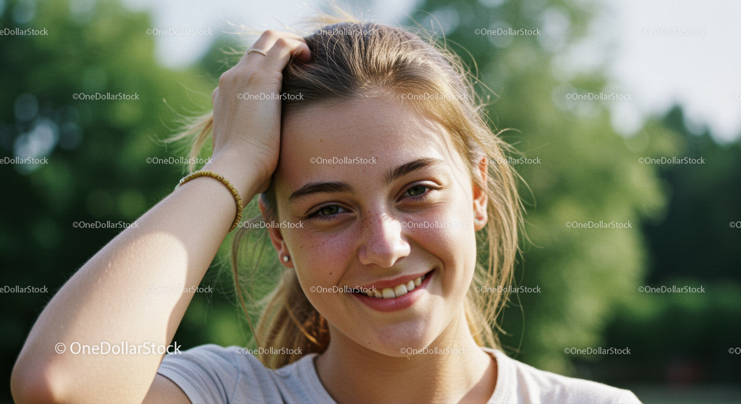 Smiling Young Woman Enjoying Sunshine in Nature