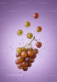 Fresh red grapes submerged in sparkling water bubbles