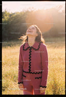 Joyful young woman laughing outdoors in warm sunlight